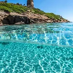 Aparthotel With Air Conditioning And Private Outdoor Area Just A Few Minutes From La Pelosa Punta de su Torrione