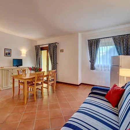 With Air Conditioning And Private Outdoor Area Just A Few Minutes From La Pelosa 3*