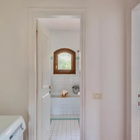 With Air Conditioning And Private Outdoor Area Just A Few Minutes From La Pelosa Punta de su Torrione